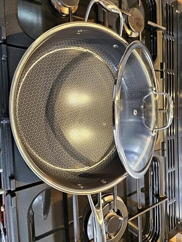 Hybrid Sauté Pan and lid on a hob